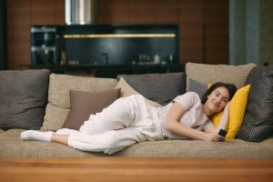 Woman recovering on couch